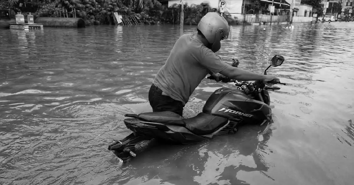 Riding Motorcycle in Bali's Flood - Post-Flood Care Guide